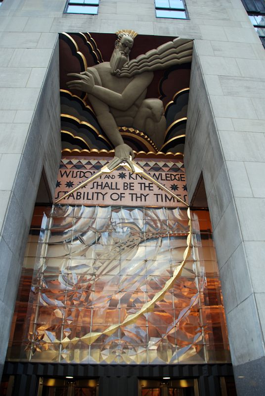 New York City Rockefeller Center 03B Frieze Above Main Entrance By Lee Lawrie Depicts Wisdom With Slogan Wisdom and Knowledge Shall Be The Stability Of Thy Times